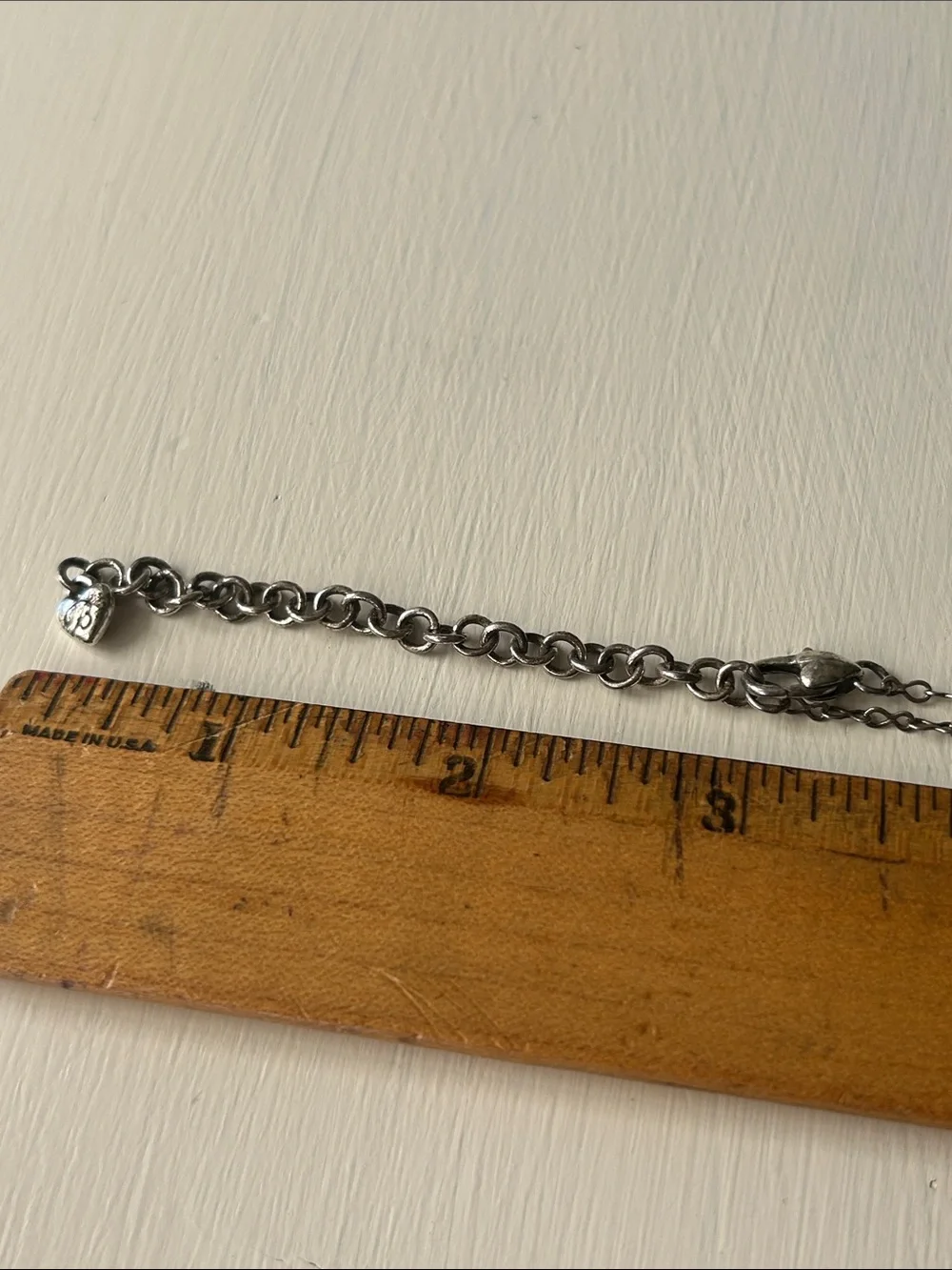 Brighton Art & Soul necklace featuring mixed-metal horseshoe pendant/charms.